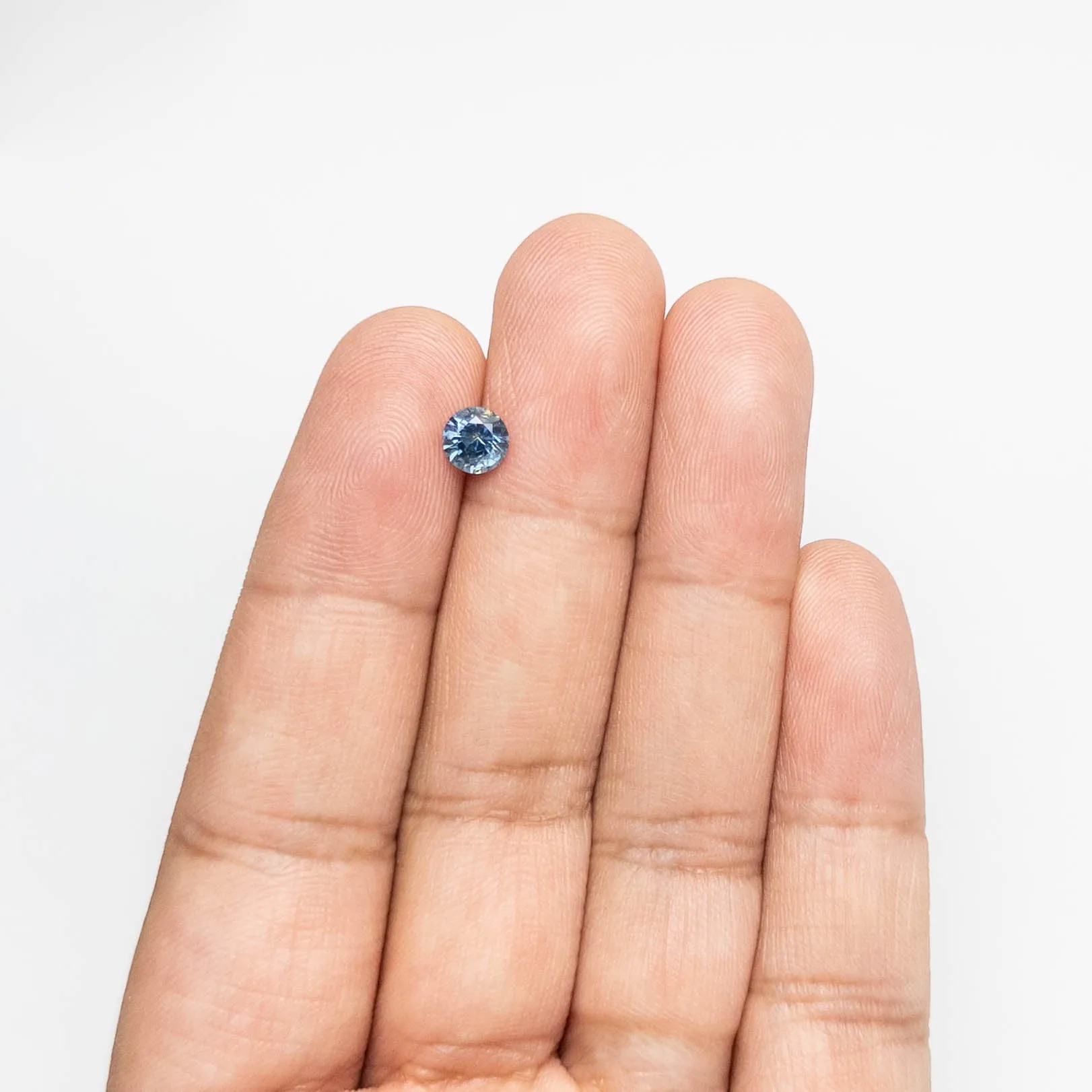 0.78ct 5.61x5.58x3.67mm Round Brilliant Sapphire 19942-34