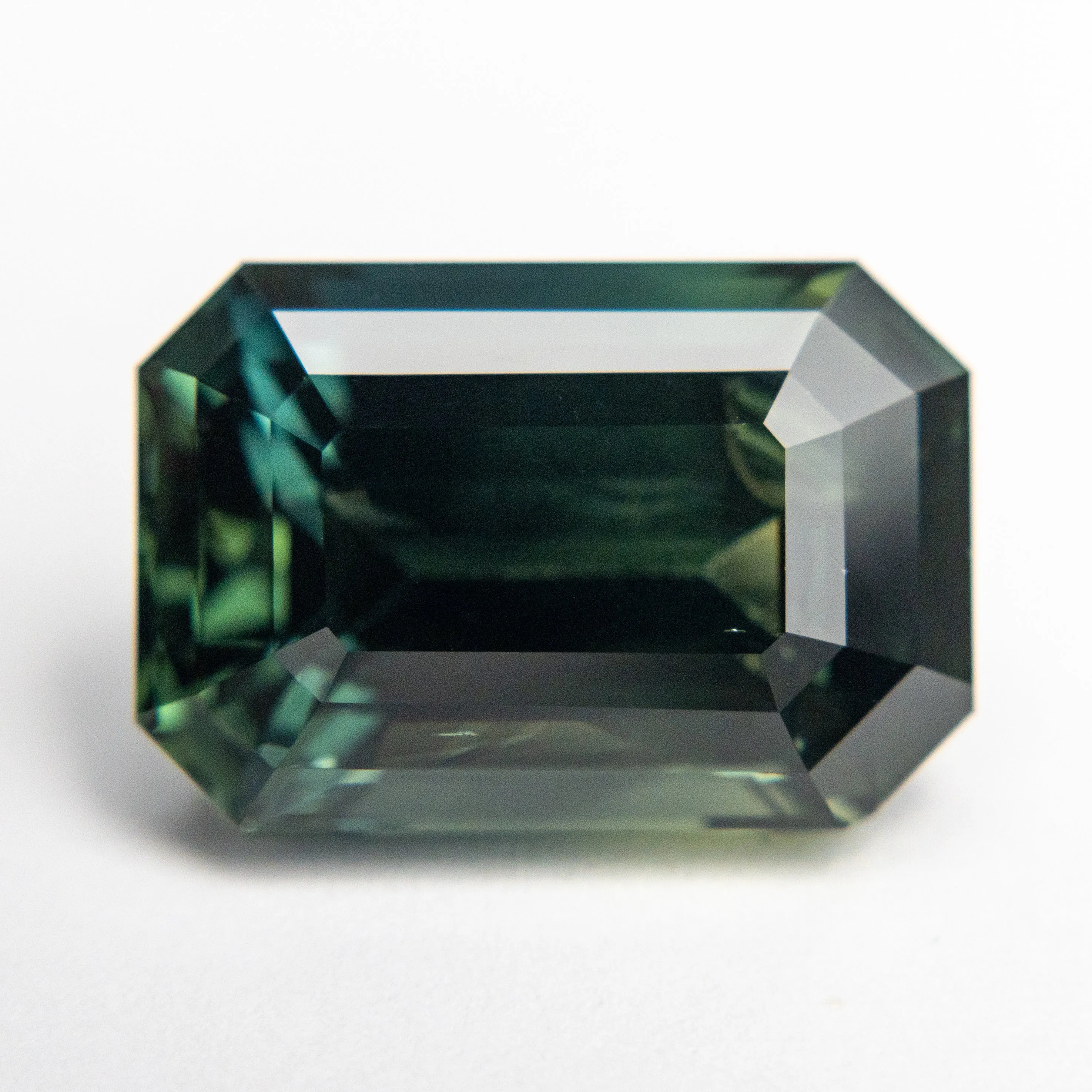 10.60ct 14.13x9.70x7.56mm Cut Corner Rectangle Step Cut Sapphire 18972-01