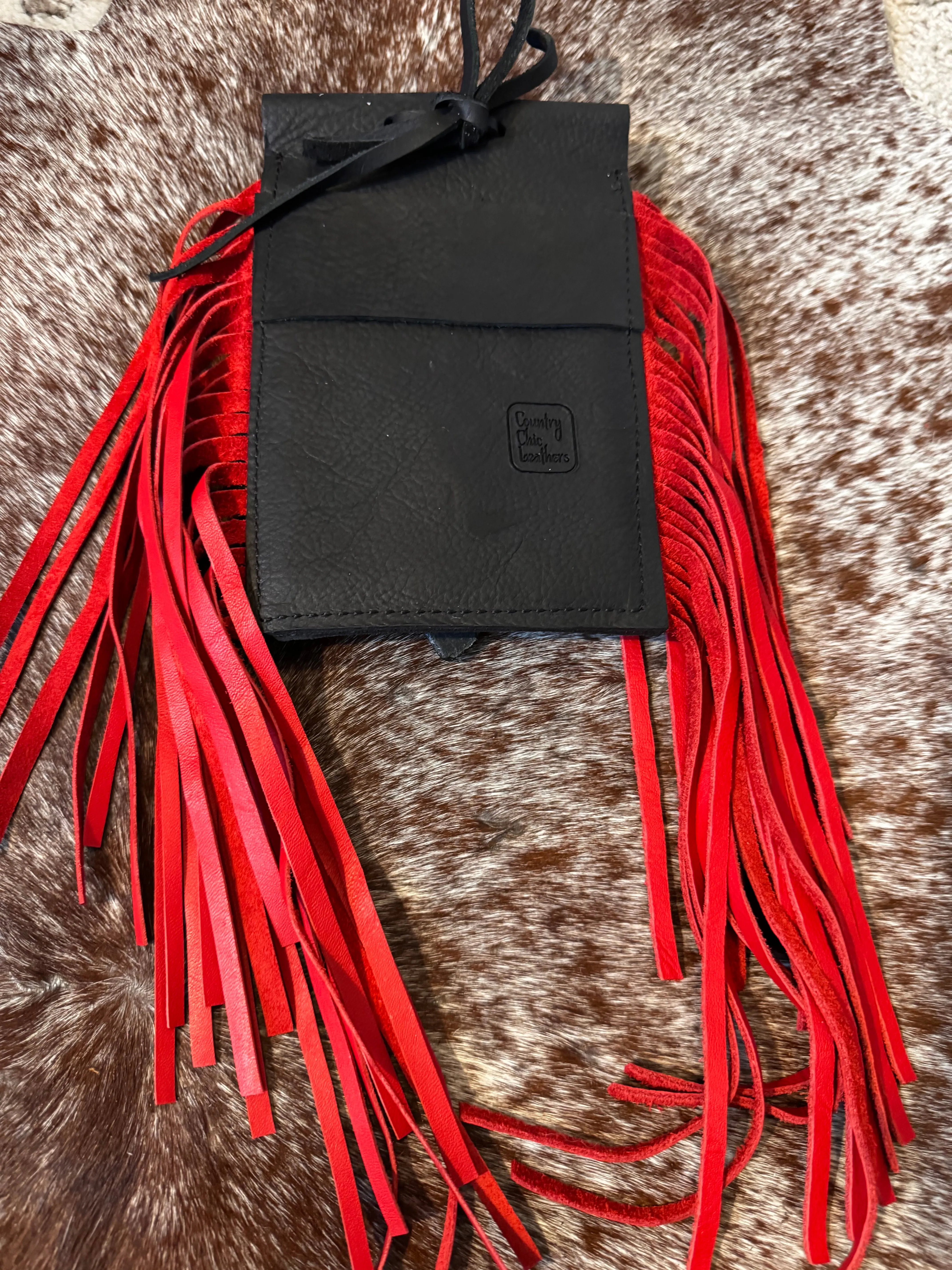 Back cinch saddle cell phone holder